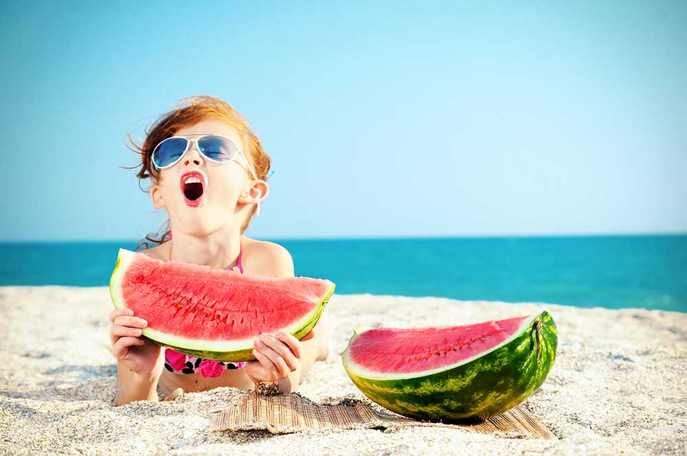 kid eating watermelon